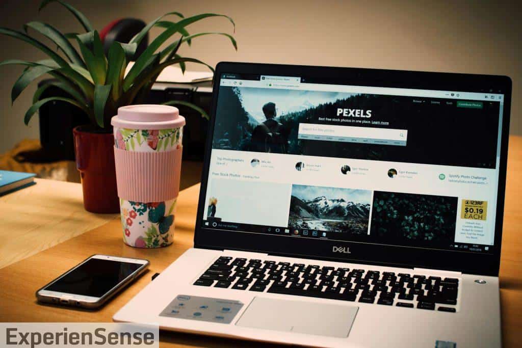 Photo of a Gray Dell Laptop Displaying Pexels Webpage